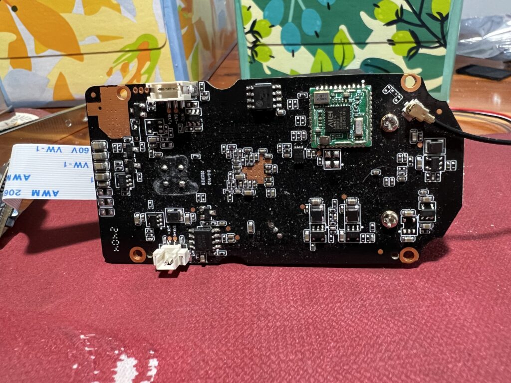 Rear view of the main circuit board. Mainly support chips like a battery charging chip, the WiFi module, and I think an audio amplifier chip.